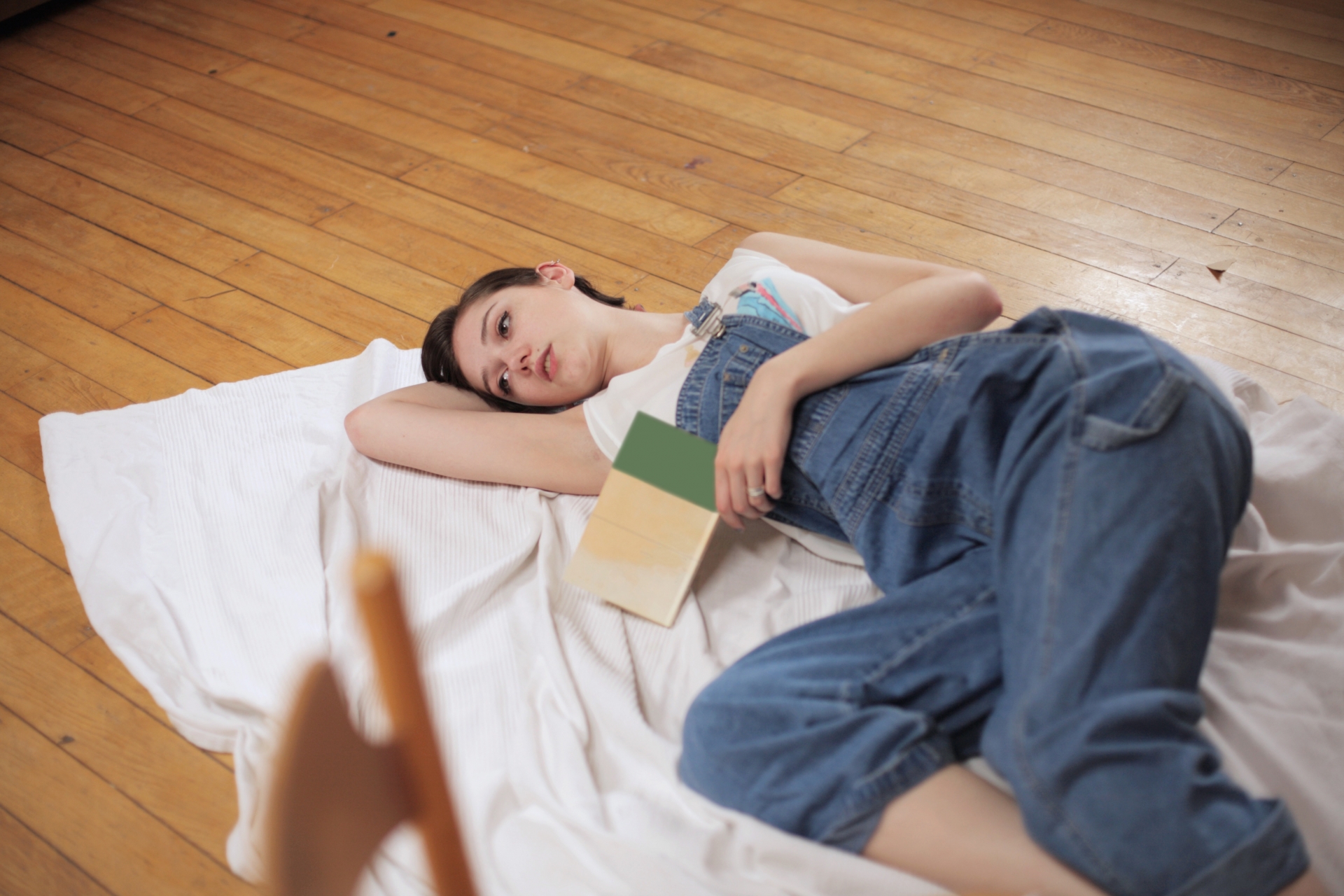 Lie down. Female lying down. Towel lying on the Floor.